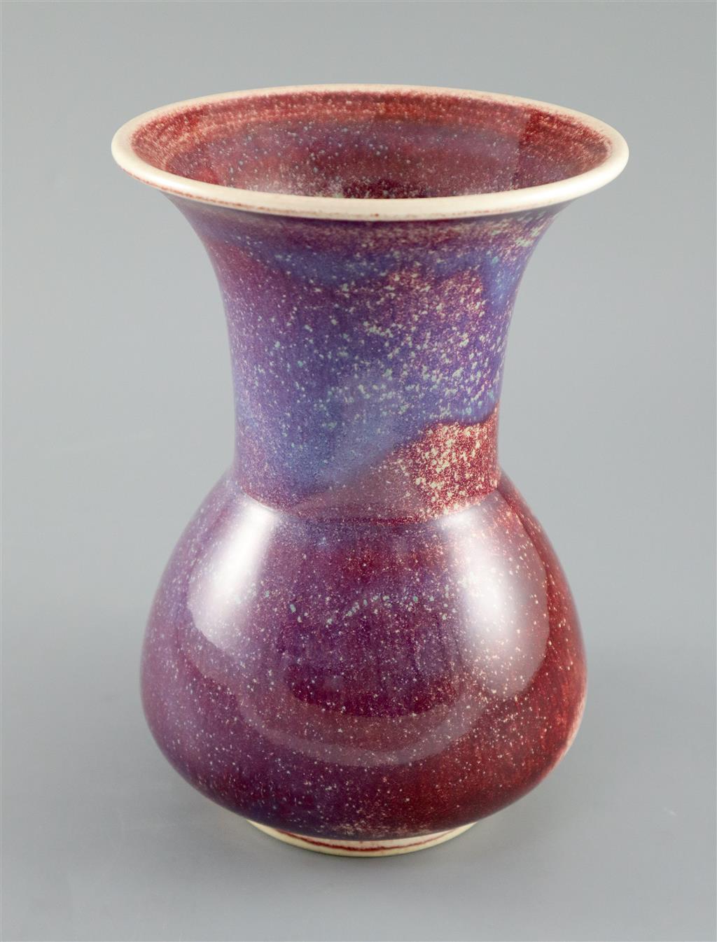 A Ruskin high fired flambe glazed vase, dated 1911, 22cm high